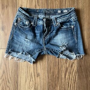 Miss Me Angel Wing Bling Cutoff Denim Shorts with rhinestones and frayed hems